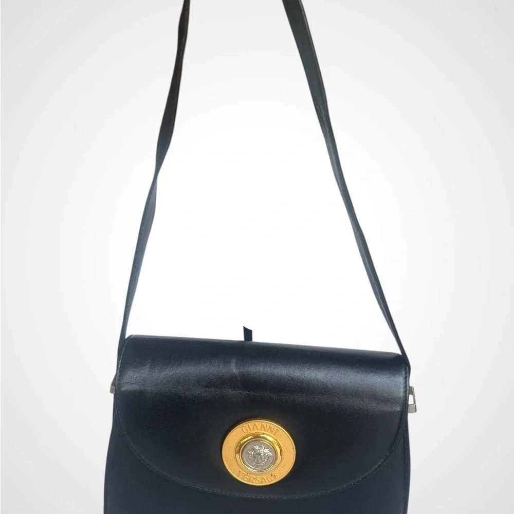 Versace Black and Gold Shoulder Bag with Classic Design